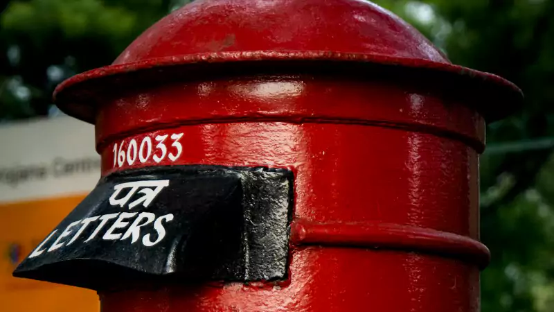 Classic red postbox symbolizing the end of the traditional envelope era - Siyahi Blog